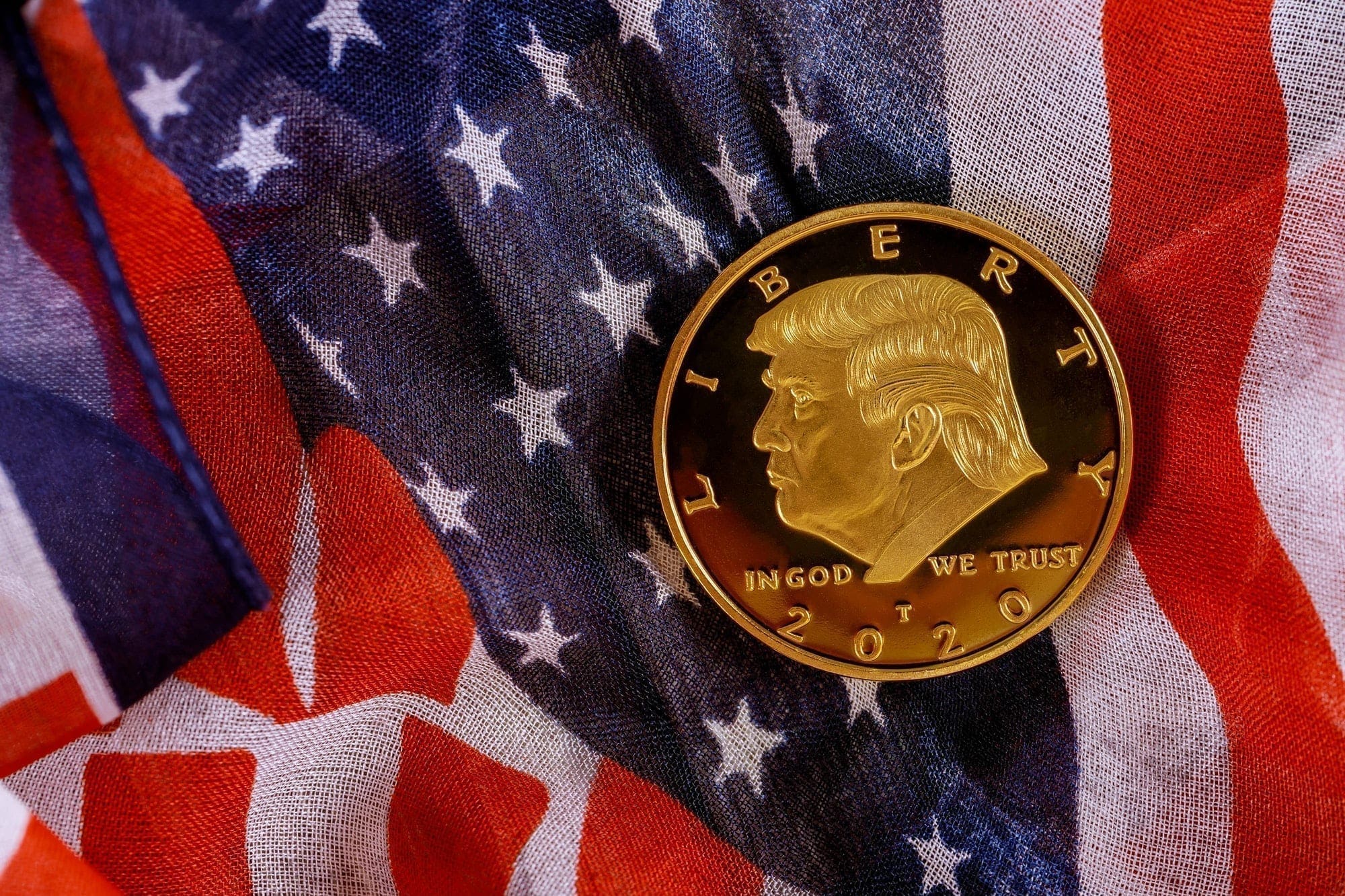 New York NY NOV 12 2019: Donald Trump coin in against usa flag in the election 2020