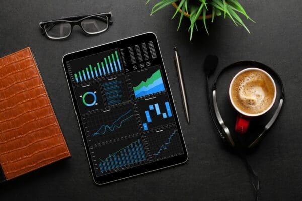 Tablet with business reports and charts